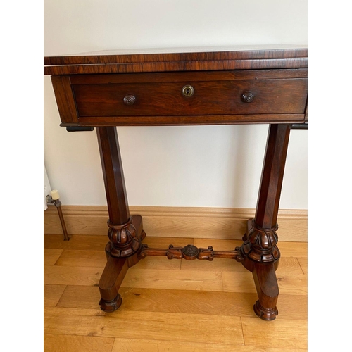 48 - A WILLIAM IV ROSEWOOD GAMES TABLE, with draught board to interior, standing on column legs supported... 