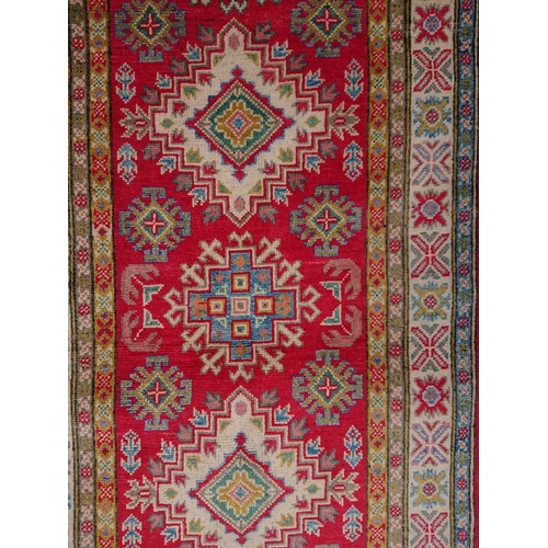 5 - A BEAUTIFUL AFGHAN KAZAK RUNNER RUG, material: hand spun wool with natural organic dyes; design: thi... 