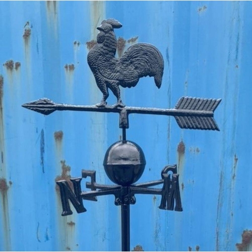 56 - A TRADITIONAL CAST IRON WEATHER VANE, with cockerel to top, standing on four feet. Dimensions: 36 in... 