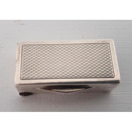 64 - A SILVER SNUFF BOX, rectangular form decorated with engine turned design. Dimensions: 3.5cm long app... 