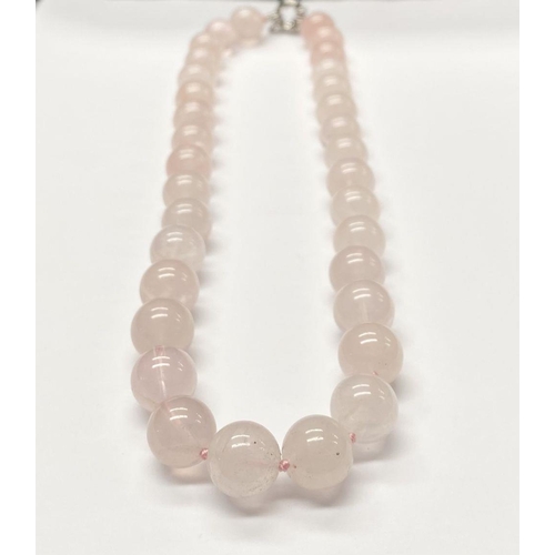 65 - A LOVELY ROSE QUARTZ BEADED NECKLACE, with silver tone clasp, 27cm long approx.