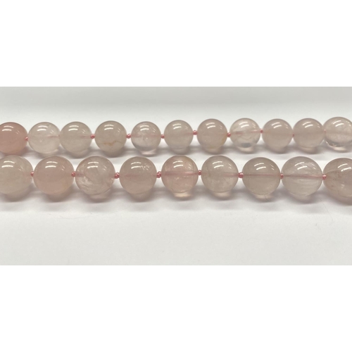 65 - A LOVELY ROSE QUARTZ BEADED NECKLACE, with silver tone clasp, 27cm long approx.