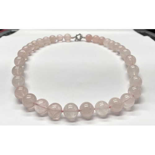 65 - A LOVELY ROSE QUARTZ BEADED NECKLACE, with silver tone clasp, 27cm long approx.