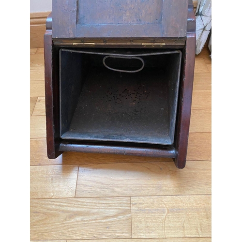 84 - A MAHOGANY SLOPE FRONT COAL BOX with brass handle to top, shaped sides, panelled front with brass ha... 