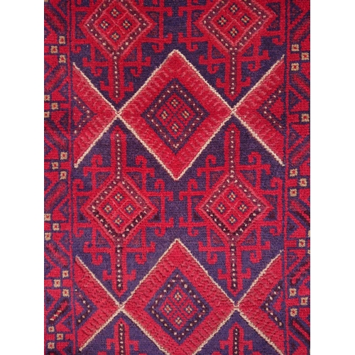 86 - A VIBRANT AFGHAN RUNNER RUG, material: hand spun wool with natural organic dyes; design: this rug fe... 