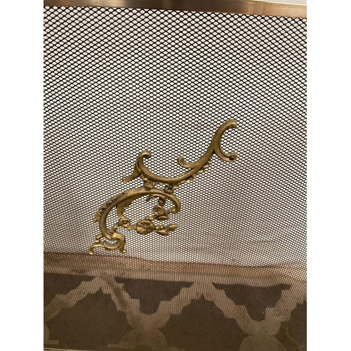 9 - A BRASS THREE PANEL FIRESCREEN, with scroll detail to front and handle. Dimensions: 64cm high x 80cm... 