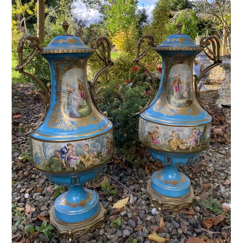 1 - A PAIR OF EXCEPTIONAL FRENCH SERVES STYLE PORCELAIN VASES, urn form, finely decorated with painted p... 