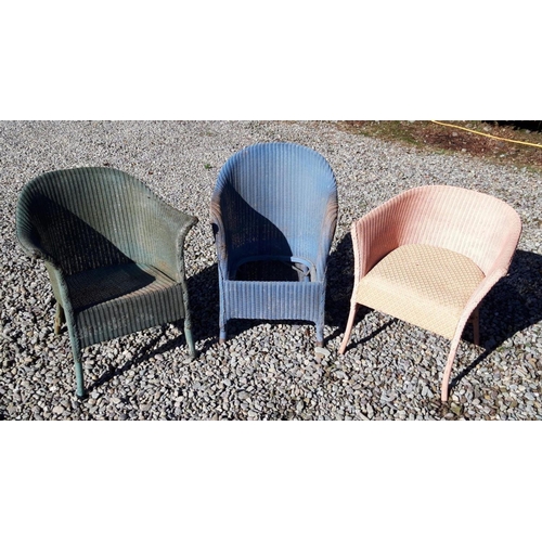 103 - A SET OF THREE VINTAGE LLOYD LOOM CHAIRS, with original paint in green, blue and pink, one dating No... 