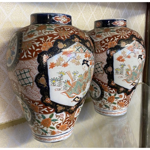 108 - A PAIR OF EXCELLENT IMARI PORCELAIN VASES, baluster form, with octagonal painted panels to front and... 