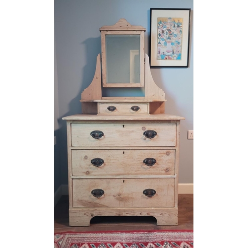 109 - A GOOD QUALITY VINTAGE PINE DRESSING UNIT, with a raised swing mirror to the back with a single draw... 