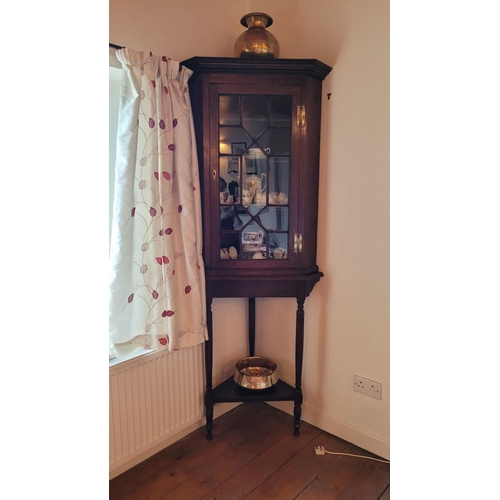 111 - A VERY GOOD QUALITY 18TH CENTURY OAK GLAZED CORNER CABINET ON STAND, the corner cabinet to the top h... 