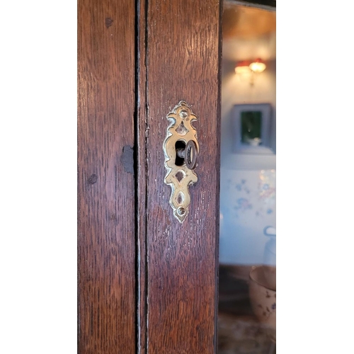 111 - A VERY GOOD QUALITY 18TH CENTURY OAK GLAZED CORNER CABINET ON STAND, the corner cabinet to the top h... 