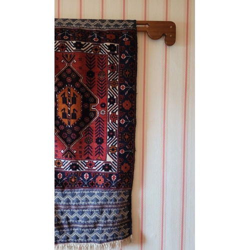 118 - A BEAUTIFUL PERSIAN TRIBAL KILIM WALL HANGING, with central medallion surrounded by geometric shaped... 