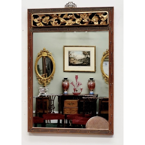 121 - A CARVED GILT WALL MIRROR WITH FLORAL DECORATION, 78 x 54cm