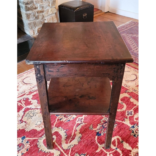 126 - AN ANTIQUE SIDE / LAMP TABLE, raised on four square legs united by a lower tier shelf. The table is ... 