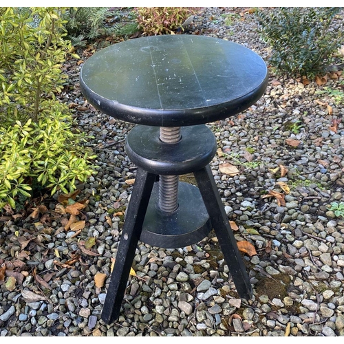 132 - A VINTAGE REVOLVING ‘CORKSCREW’ STOOL, in black with splayed tripod legs. Dimensions: 54cm high x 36... 