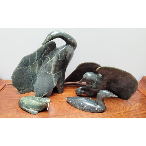 139 - A SET OF CANADIAN ESKIMO INUIT STONE ART, includes four pieces; a duck, a walrus, a sea gul in fligh... 