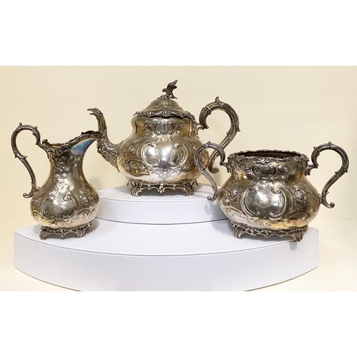 14 - A SUBSTANTIAL VICTORIAN SILVER TEA SET, to include teapot, sugar bowl and milk jug, Maker Martin, Ha... 