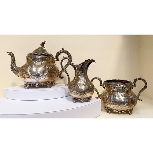 14 - A SUBSTANTIAL VICTORIAN SILVER TEA SET, to include teapot, sugar bowl and milk jug, Maker Martin, Ha... 