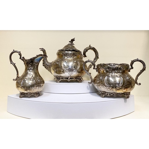 14 - A SUBSTANTIAL VICTORIAN SILVER TEA SET, to include teapot, sugar bowl and milk jug, Maker Martin, Ha... 