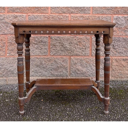 147 - A VINTAGE MAHOGANY OCCASSIONAL TABLE, pierced detail atop turned legs supported by undertier. Dimens... 