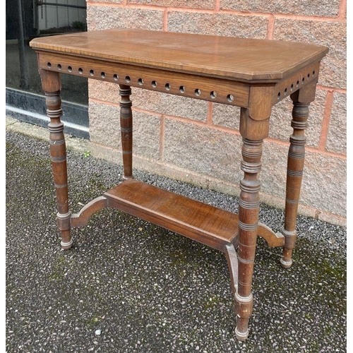 147 - A VINTAGE MAHOGANY OCCASSIONAL TABLE, pierced detail atop turned legs supported by undertier. Dimens... 