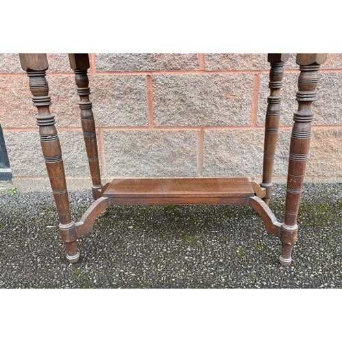 147 - A VINTAGE MAHOGANY OCCASSIONAL TABLE, pierced detail atop turned legs supported by undertier. Dimens... 