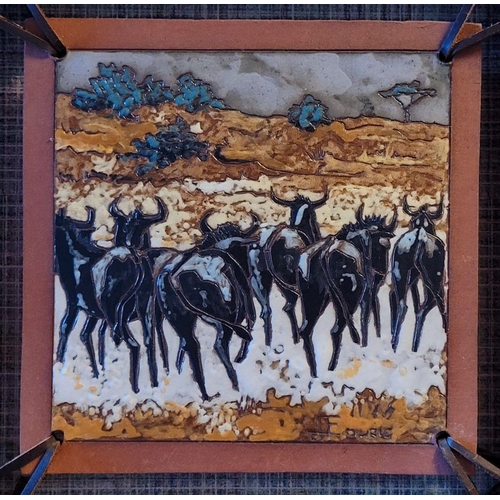 151 - J LOURIE, STAMPEDING WILDEBEEST, tile art/glazed tile, incised name lower right, 37cm x 37cm frame, ... 