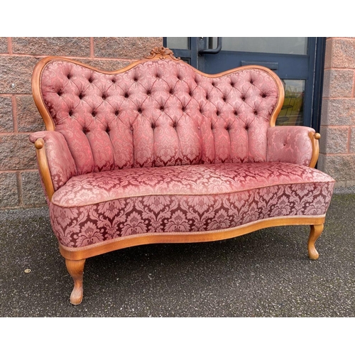 152 - A VINTAGE ROCOCO STYLE SETTEE, with curved shape, stained frame, finely upholstered with button back... 