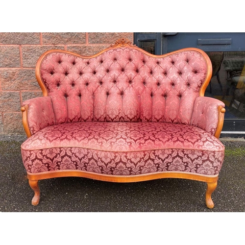 152 - A VINTAGE ROCOCO STYLE SETTEE, with curved shape, stained frame, finely upholstered with button back... 