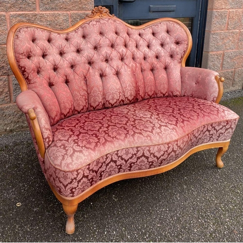 152 - A VINTAGE ROCOCO STYLE SETTEE, with curved shape, stained frame, finely upholstered with button back... 