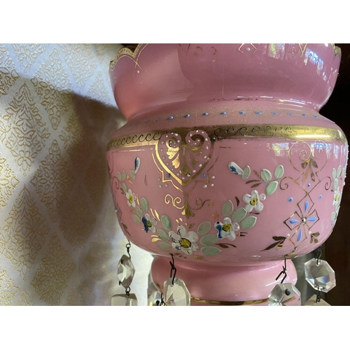 153 - A VICTORIAN PINK OPALINE LUSTRE MANTLE VASE, finely decorated with painted blue floral details and g... 