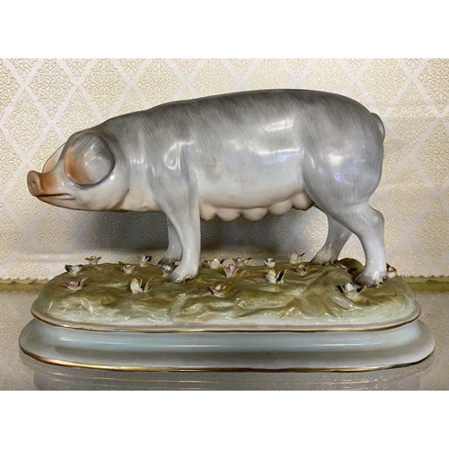 162 - A 20TH CENTURY MEISSEN PORCELAIN PIG/SOW FIGURINE, wonderful detail, standing on shaped base with fl... 