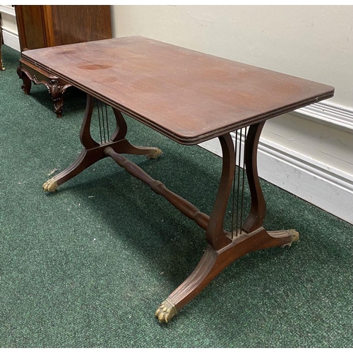 163 - AN ANTIQUE MAHOGANY COFFEE TABLE, with harp leg design supported by turned stretcher, fluted legs wi... 