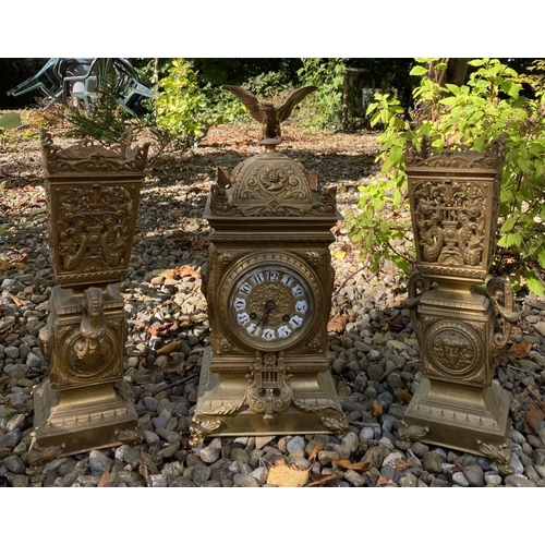 17 - AN ANTIQUE FRENCH ORMOLU MANTLE CLOCK AND PAIR OF URNS, solid bronze, all finely decorated with embo... 