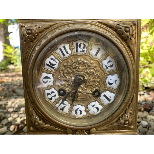 17 - AN ANTIQUE FRENCH ORMOLU MANTLE CLOCK AND PAIR OF URNS, solid bronze, all finely decorated with embo... 