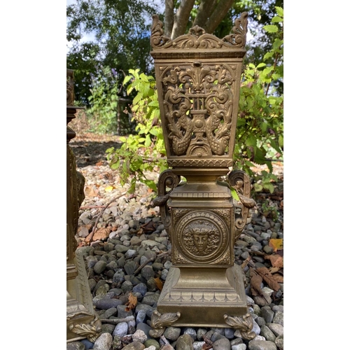 17 - AN ANTIQUE FRENCH ORMOLU MANTLE CLOCK AND PAIR OF URNS, solid bronze, all finely decorated with embo... 