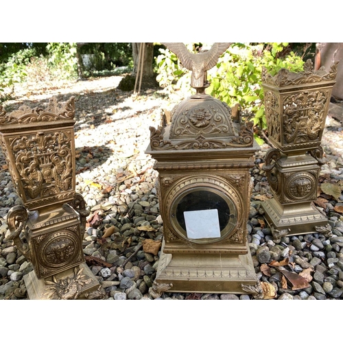 17 - AN ANTIQUE FRENCH ORMOLU MANTLE CLOCK AND PAIR OF URNS, solid bronze, all finely decorated with embo... 