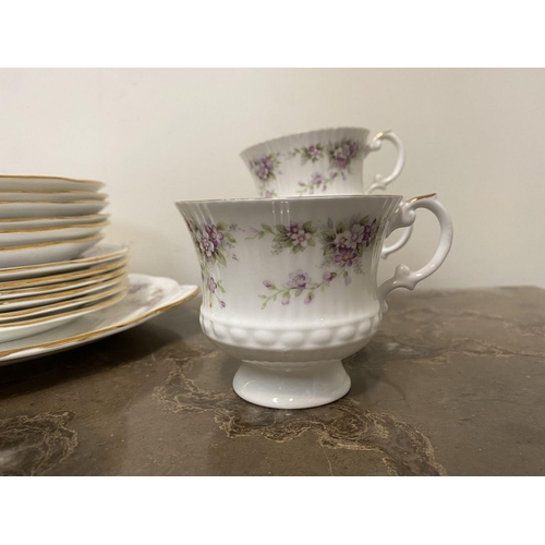 178 - A VINTAGE STAFFORDSHIRE FINE BONE CHINA TEA SET, hand decorated in the Elizabethan pattern, to inclu... 