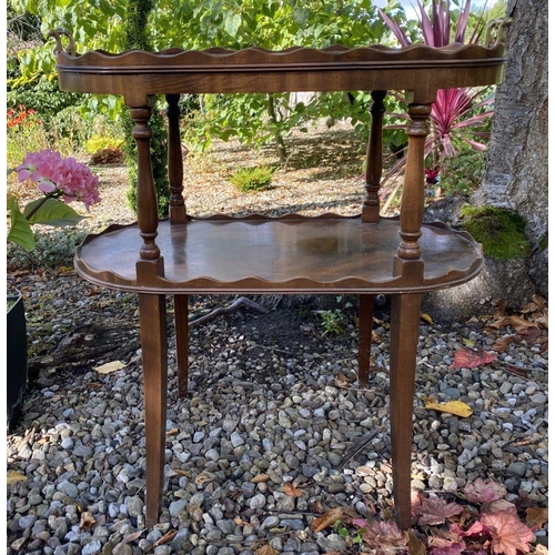 179 - AN ANTIQUE MAHOGANY TWO-TIER SIDE TABLE/WHATNOT, with galleried top to two tiers, on turned supports... 