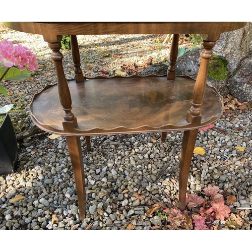 179 - AN ANTIQUE MAHOGANY TWO-TIER SIDE TABLE/WHATNOT, with galleried top to two tiers, on turned supports... 