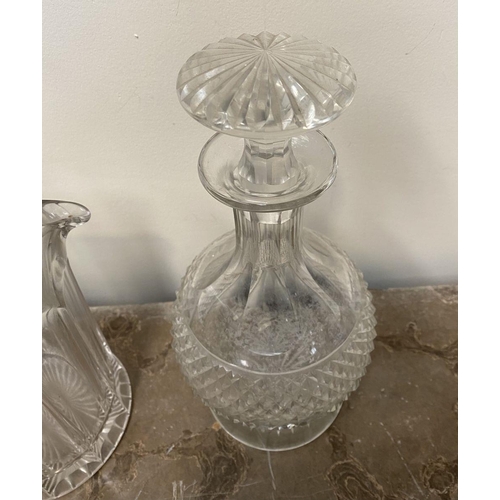 181 - A VINTAGE GLASS LOT TO INCLUDE (i) a cut glass decanter with fluted body and neck, star cut base and... 