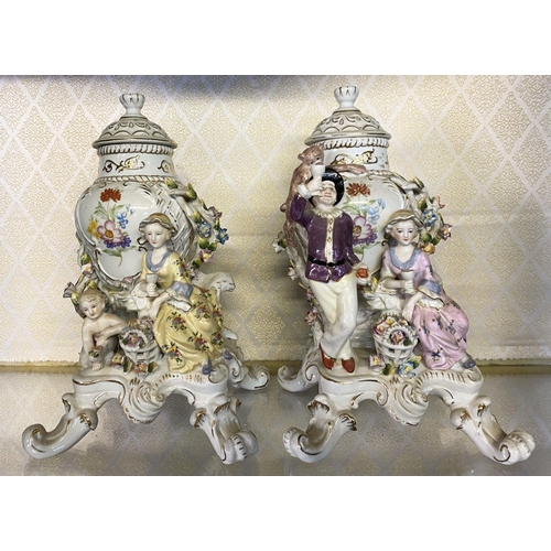 183 - A PAIR OF MEISSEN PORCELAIN FIGURAL COVERED VASES, finely decorated with painted floral details with... 