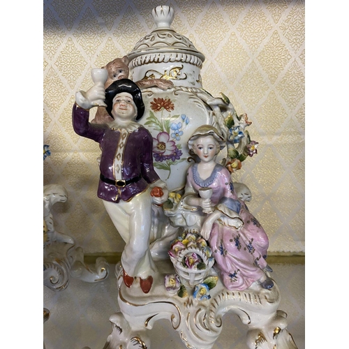 183 - A PAIR OF MEISSEN PORCELAIN FIGURAL COVERED VASES, finely decorated with painted floral details with... 