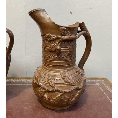 188 - A COLLECTION OF THREE VINTAGE FRENCH HANDMADE STONEWARE JUGS, with one unique lidded pitcher likely ... 