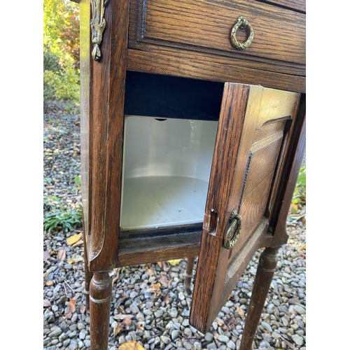 20 - A PAIR OF 19TH CENTURY MARBLE TOPPED BEDSIDE LOCKERS, with one drawer above panelled door, with bras... 