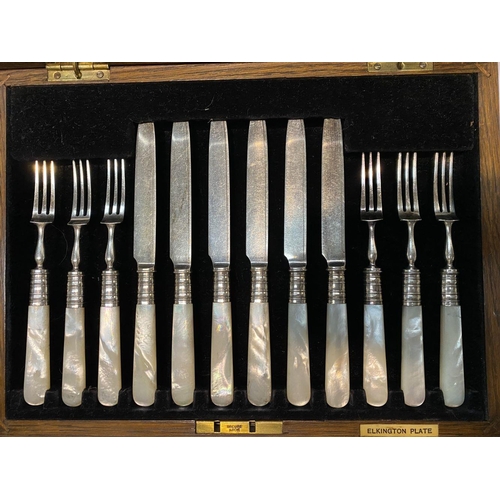 214 - A VINTAGE CASED ELKINGTON PLATED CUTLERY SET, to include six knives and six forks with mother of pea... 