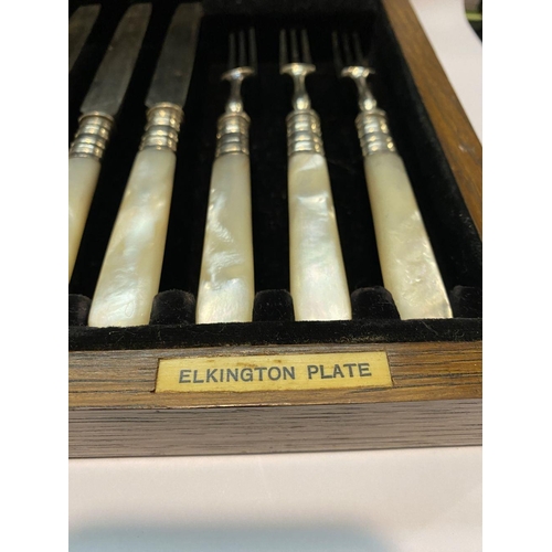 214 - A VINTAGE CASED ELKINGTON PLATED CUTLERY SET, to include six knives and six forks with mother of pea... 