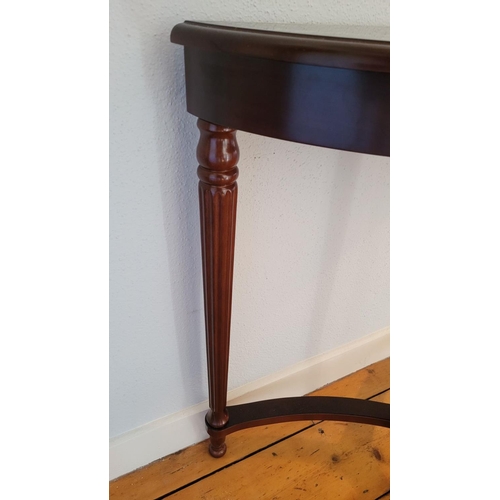 218 - A GOOD QUALITY DEMI-LUNE SHAPED SIDE / CONSOLE TABLE, contemporary piece of furniture in the antique... 