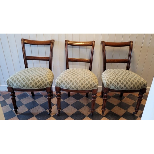 226 - A SET OF THREE VICTORIAN CHAIRS, each with a stuffed over padded seat with trim, the back with a pai... 